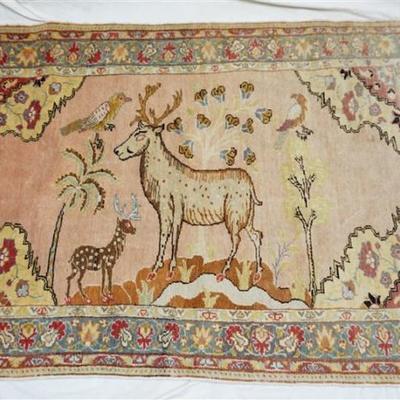 Contemporary Good Quality 100% Wool Hand Knotted Persian Rug with Deer and Bird. Soft Colors, in good condition, with the original metal...