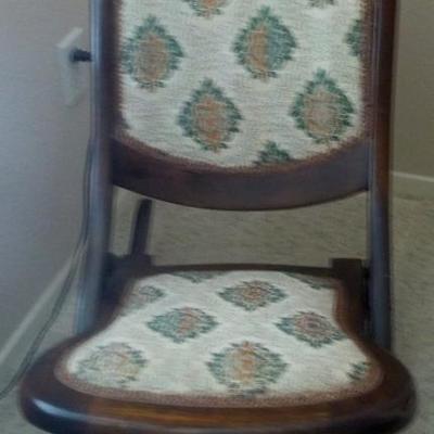 Antique folding rocking chair.
