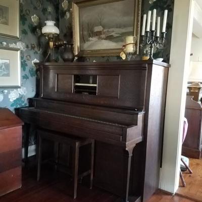 Player Piano with over twenty-five excellent condition player rolls, music from the ear of 20's 30' 40's 50's best...