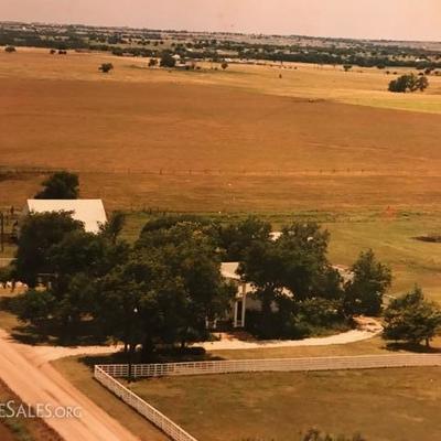 Acreage for sale. with cottage and house, barn, three car garage, fenced and and ready to move in, now!