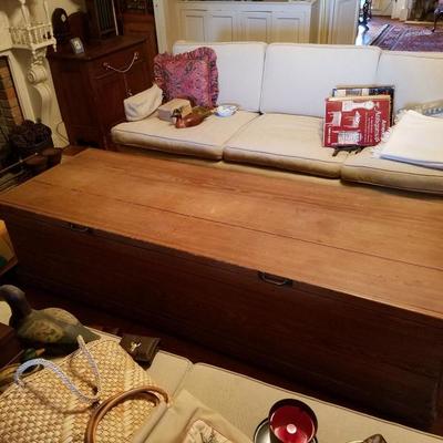 wooden bench this example is set at the end of bed 