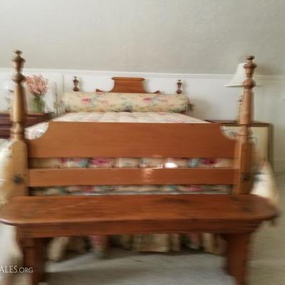 bench at foot of queen size bed.