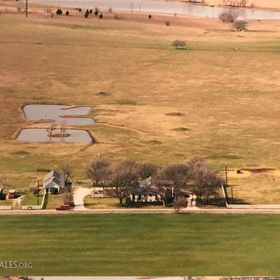 Acreage for sale. with cottage and house, barn, three car garage, fenced and and ready to move in, now!