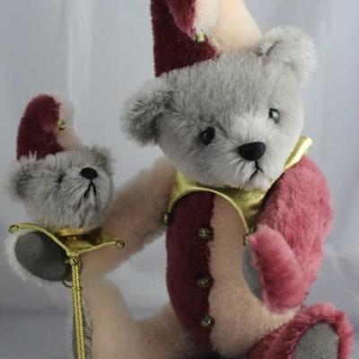 Bearoretto-198.  Gray Jester bear with a a rose &  pink body suit.  Gold metallic capelet with jingle  bells, holds a matching jester...