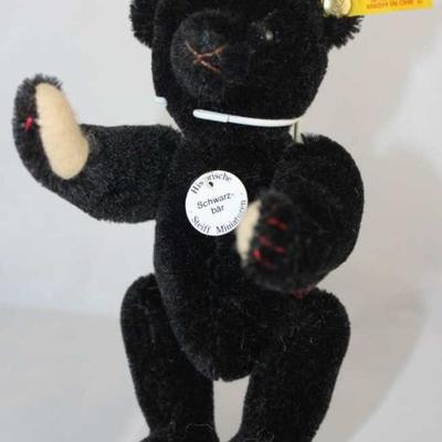 Steiff Teddy Bear - Black Bear Mini- 103 Mohair-black/flannel-it. tan.  Jtd. black mohair,  light tan flannel paw pads with red thread....