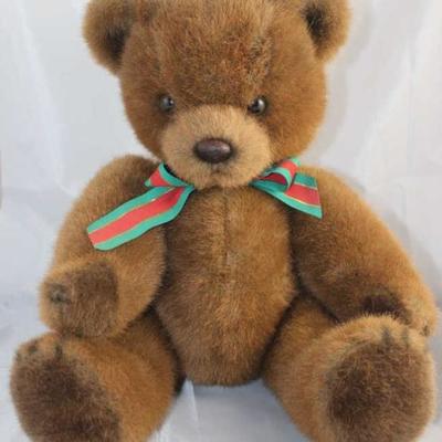 Brownie - 29. 1985 Char Company Plush-Brown  chocolate mix bear in excellent condition. Red,  green and gold ribbon-striped tie. Size:...