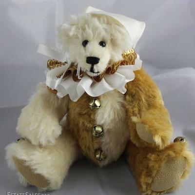 Tabasco-193.  Hump-backed Jester Bear stuffed with  plastic pellets.  Around neck a double ruffle  (bottom-white satin, top-gold...