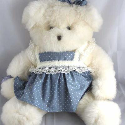 Bridgette - 64. 1989 Plush-white JDawn  Chitner-Bridgewood Bear. Non-jtd. Plump bear  wearing a whit lace trimmed blue pinafore with...