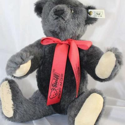 Antic (Antique) Teddy-292.  1990 Walt Disney World  Teddy Bear Convention III.  Margaret Strong Bear  with hump on back and growler.  Red...