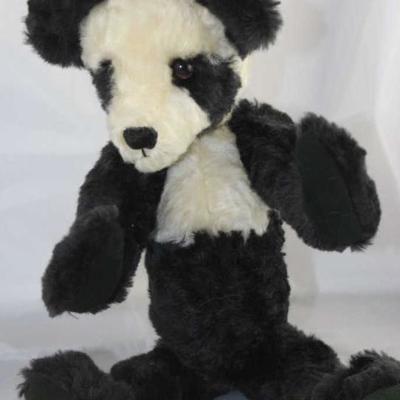 Tgler - 10. By Cynthia Glickman - Willow Creek.  Plush (distressed) black and white. Modeled on the  Chinese Sun Bear (an extinct...