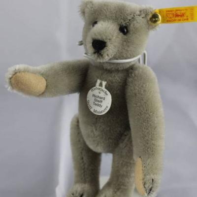 Steiff Teddy Bear - Richard Steiff Mini-107 Mohair-gray/flannel-light tan.  Jtd. grey mohair  bear with light tan flannel paw pads....