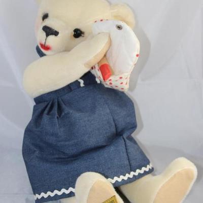 Miss Mischief-325, Merrythought-England in mohair  white.  Bear with a growler.  She carries her  make-up.  Ltd. # of 2000. Size:  16