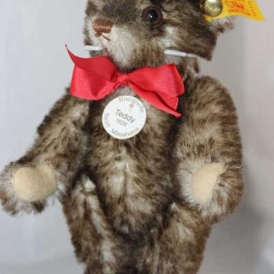 Steiff Teddy Bear - Happy (Anniversary)-Mini-Teddy  1926-73.  Jtd. grey brown tipped mohair plush  miniature bear with light tan flannel...