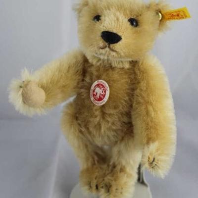 Steiff Teddy Bear - Barle PAB Mini-97.  Jtd.  caramel mohair bear with cream flannel paw pads.   Wears a white elephant historic chest...
