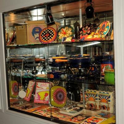SHOWCASE FULL OF PETER MAX COLLECTIBLES