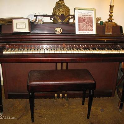 Wurlitzer wood and leatherette wrapped piano