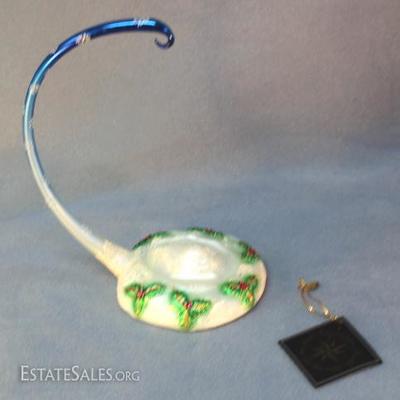 Christopher Radko Christmas ornament stand.  Has  white snow base with holly and a blue arm with  snowflakes.  Designer glass ornaments...