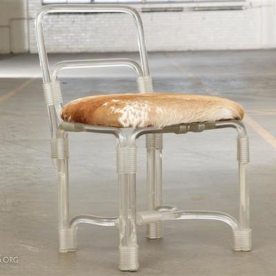A Fabulous Acrylic Chair With Pony Seat