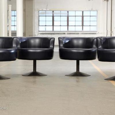 Set Of Four Navy Blue Low Back Swivel Chairs, Circa 1970's