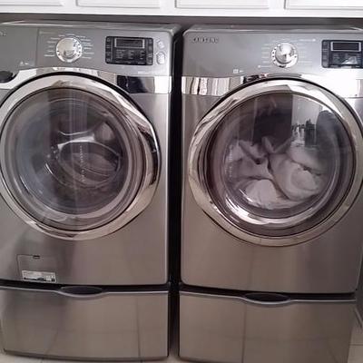 $1,500 for the pair with pedestals,  5 cu ft washer with steam, light to normal use.  Great condition.