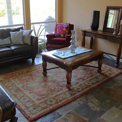 Area rug, coffee tables, entry table, love seat, recliner