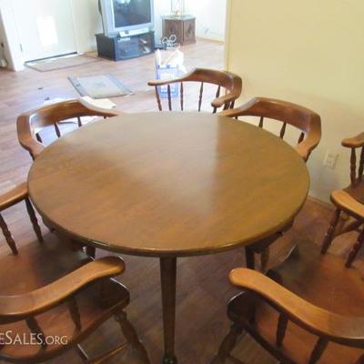 Vintage round wooden table with barrel shaped chairs (6); table has 4 drawers