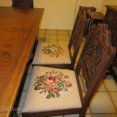 19th century dining table with hidden pull out leaves and 6 chairs