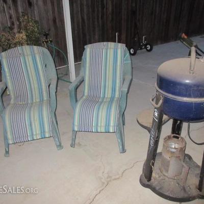 Broiling Grill and two patio chairs