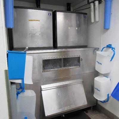Dual Manitowoc 3000 Lb Capable Air Cooled Ice Makers On Single Large Capacity Stainless Bin
