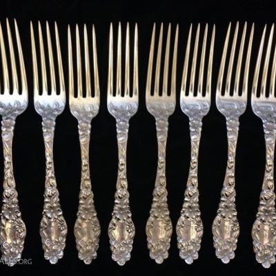 8 ANTIQUE GEO. W. SHIEBLER STERLING SILVER FORKS, FLORA PATTERN, APPROX 7.75"L, MONOGRAMMED, APPROX 551 GRAMS TOTAL STERLING WEIGHT
