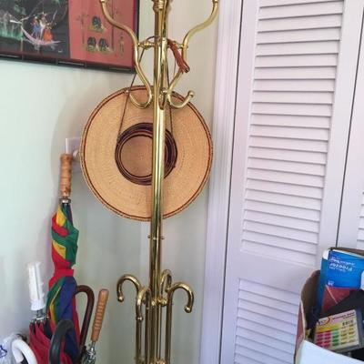 Brass Coat Hanger and Hats.