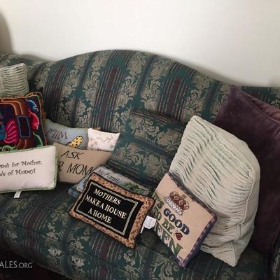 Sofa with assorted pillows.