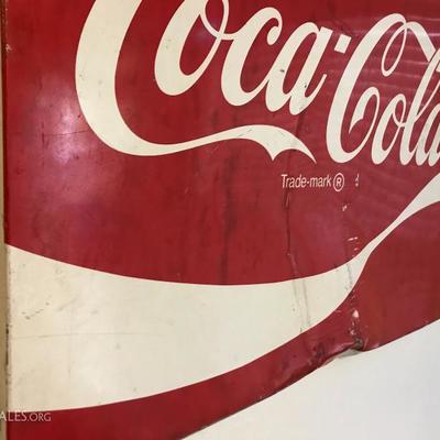 Vintage Coca-Cola metal sign. (Price ranges from $125-200) Price at estate sale: $100