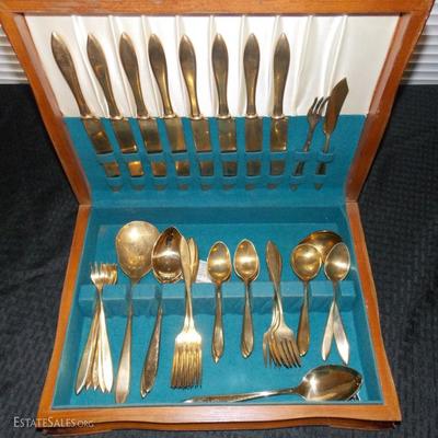 Another set of gold colored flatware