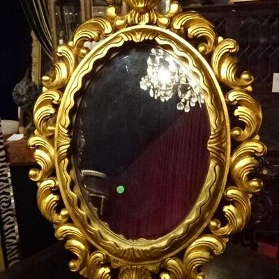 OVAL ROCOCO GILT WOOD MIRROR