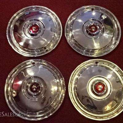 4 VINTAGE FORD THUNDERBIRD HUBCAPS