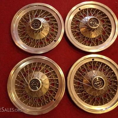 4 VINTAGE FORD THUNDERBIRD HUBCAPS