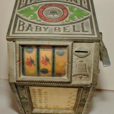 Puritan Baby Bell TRADE STIMULATOR Â© 1928 Reliable Coin Machine Exchange.