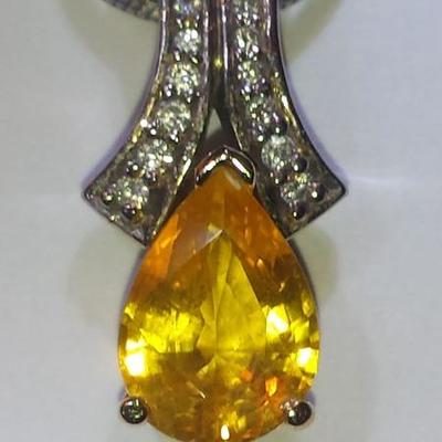 2.58ct yellow sapphire pendant with 18 diamonds- buy appointment only