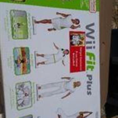 New WiiÂ® Fit Plus Includes the game software and Balance Board, New in Box, never used $100.00 cash as is