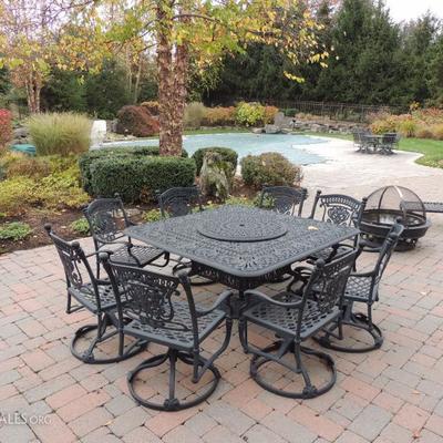 cast aluminum square table with lazy susan, eight chairs and matching lounge chair, fire pit