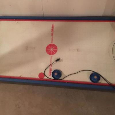 vintage air-hockey table