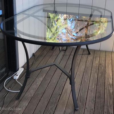 High-end Ethan Allen Outdoor Furniture set. Table and 4 chairs with pads.
