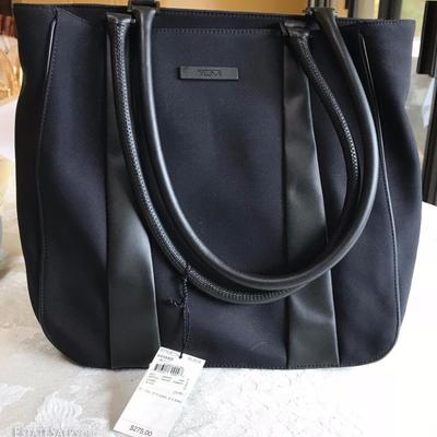 TUMI Tote New, with Tags and Protective Storage Bag.

