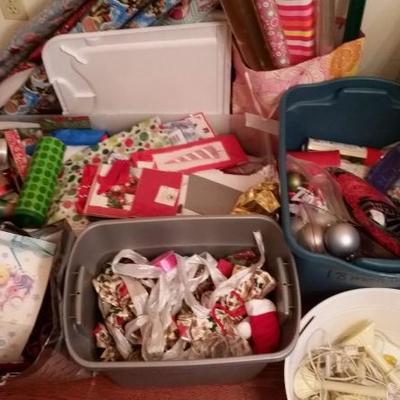 Box lot of Christmas tote, wrapping paper, ornaments, lots of goodies
