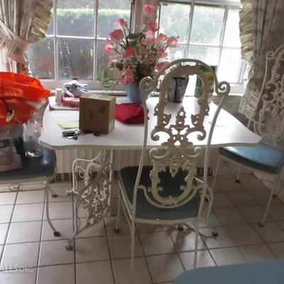 IRON TABLE AND CHAIRS GREAT FOR ANY ROOM