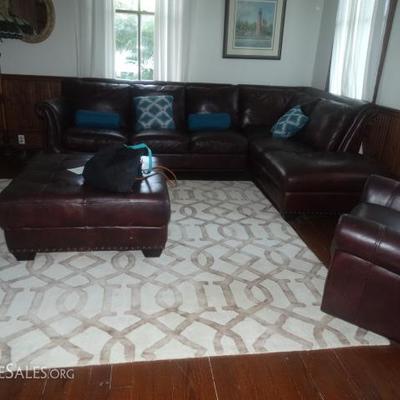 Leather sectional sofa & ottoman 
Rug - SOLD