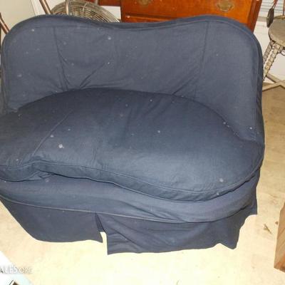 Atomic age love seat with slip cover on