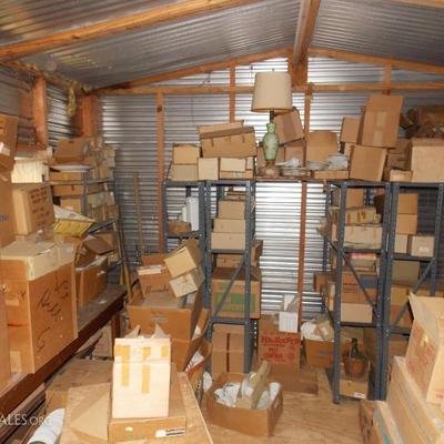 only One side of storage room with white china, plates, pitchers, tureens, cups, decorative boxes, could be used just as it is or you...