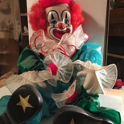 amber stone porcelain clown doll
